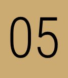 A brown background with the number 0 5 written in black.